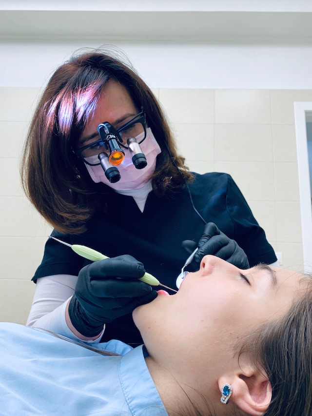 Dentist working with a patient 